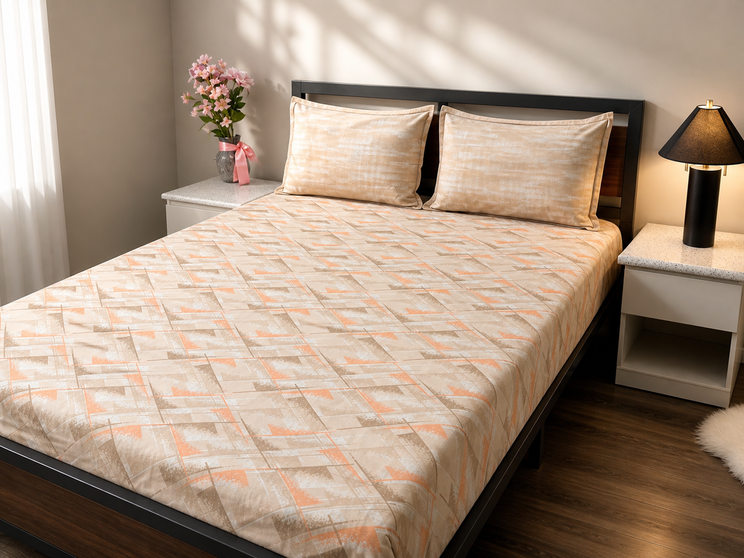 Bed with patterned bedspread in a bedroom setting